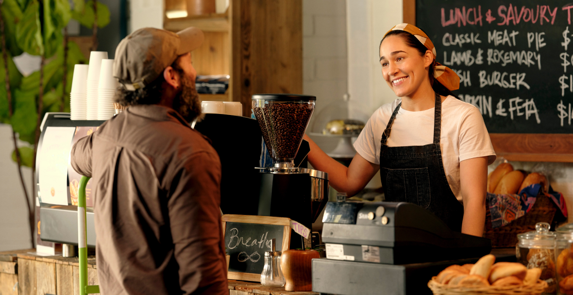 Female café owner in her café